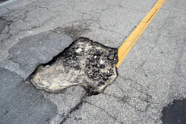 How to Fix Potholes in a Driveway Denver, CO